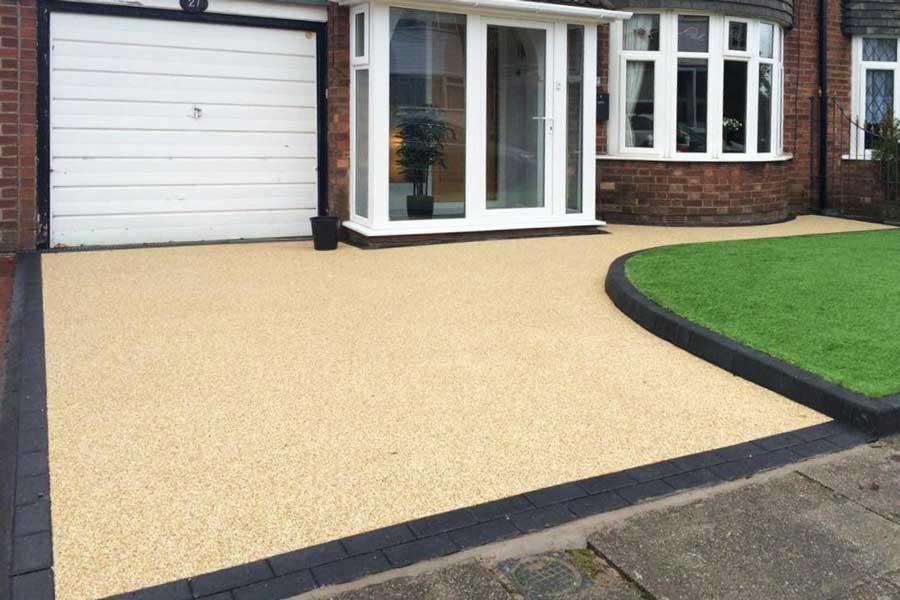 Light coloured resin driveway installation at a property in Hertfordshire