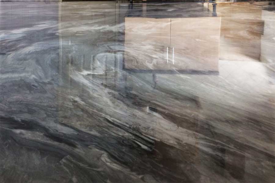 Metallic epoxy flooring installed in a kitchen in Hertfordshire